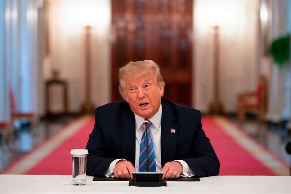 -Le président américain Donald Trump a officiellement lancé la procédure de retrait des Etats-Unis de l'Organisation mondiale de la Santé. Le 7 juillet 2020, à Washington, DC. Photo par JIM WATSON / AFP via Getty Images.