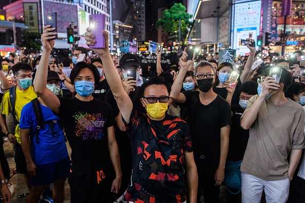 -Illustration- Des militants pro-démocratie ont été arrêtés ce matin à Hong Kong, Lam Cheuk-ting et Ted Hui ainsi que 14 autres en lien avec des manifestations de 2019. Photo par Anthony WALLACE / AFP via Getty Images.