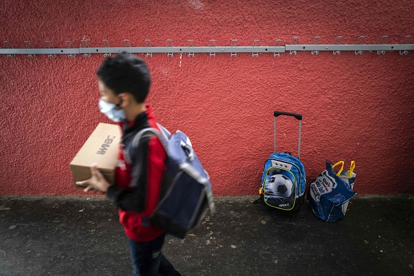 Reconfinement. Port du masque obligatoire en primaire dès l'âge de 6 ans. (Photo : LIONEL BONAVENTURE/AFP via Getty Images)