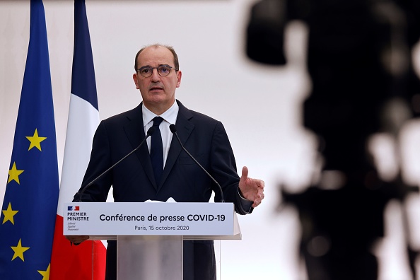 Le Premier ministre Jean Castex lors de sa conférence au lendemain de l'annonce du couvre-feu annoncé par Emmanuel Macron. (Photo : LUDOVIC MARIN/POOL/AFP via Getty Images)