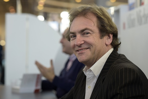 L’écrivain Didier van Cauwelaert en 2015 (LIONEL BONAVENTURE/AFP via Getty Images)