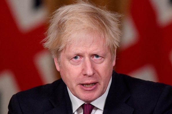 -Le Premier ministre britannique Boris Johnson a annoncé samedi l’ordre de "rester à la maison" pour Londres et le sud-est de l'Angleterre. Photo par Toby Melville / POOL / AFP via Getty Images.