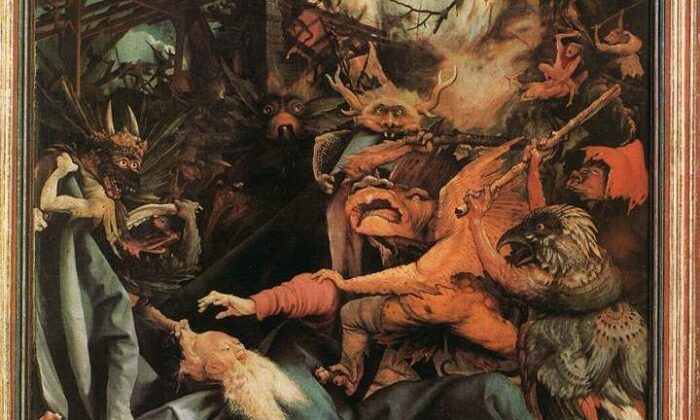 Saint Antoine est assiégé par des démons qui l'attaquent avec des bâtons à droite de la composition et, à gauche, d'autres tirent sur son manteau et ses cheveux, dans un détail de « La Tentation de saint Antoine », de Mathias Grünewald. (Domaine public)