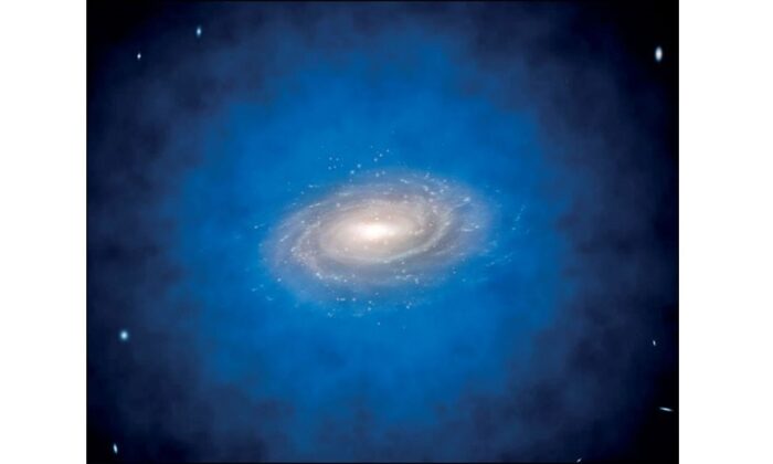 Présentation artistique d'une galaxie spirale intégrée dans une plus grande distribution de matière sombre invisible, connue sous le nom de halo de matière sombre (colorée en bleu). (ESO / L. Calçada)