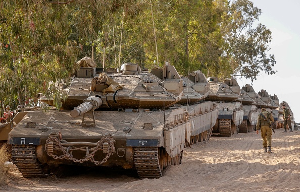 -Des chars israéliens Merkava sont déployés le long de la frontière avec la bande de Gaza le 20 mai 2021. Photo par JACK GUEZ /AFP via Getty Images.