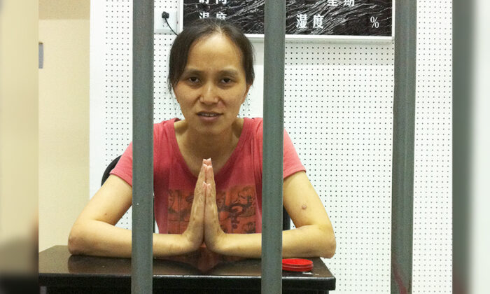 Chen Yinghua est détenue illégalement au centre de détention de Nanjing, en Chine, en juillet 2013, pour avoir refusé d'abandonner sa foi dans le Falun Gong. (Avec l'aimable autorisation de Chen Yinghua)