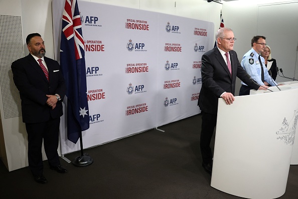 -Le Premier ministre australien Scott Morrison lors d'une conférence de presse à Sydney Le 8 juin 2021, concernant le crime organisé mondial. Photo de DAVID GRAY/AFP via Getty Images.