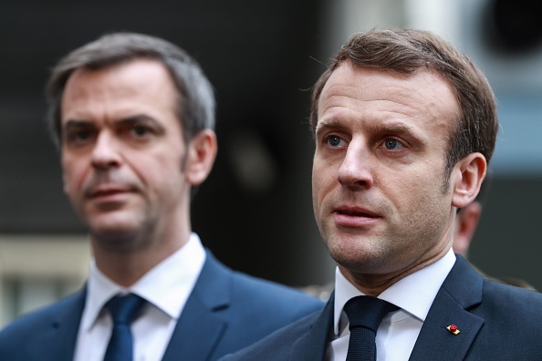 Le Président Emmanuel Macron et le ministre de la Santé Olivier Véran.  (LUDOVIC MARIN/AFP via Getty Images)