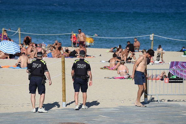 Illustration (JOSEP LAGO/AFP via Getty Images)