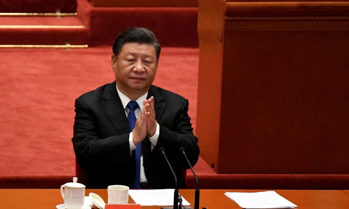 Le dirigeant chinois Xi Jinping au Grand palais du Peuple à Pékin, le 9 octobre 2021 (Noel Celis/AFP via Getty Images)

