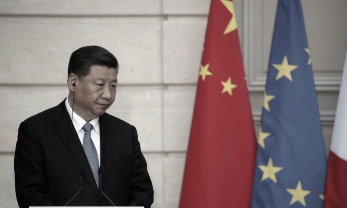 Le dirigeant chinois Xi Jinping lors de la conférence de presse avec le président français Emmanuel Macron après leur rencontre à l'Élysée, à Paris, le 25 mars 2019. (Yoan Valat/AFP via Getty Images)