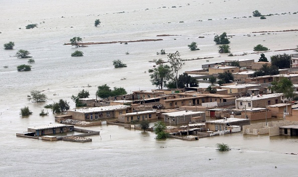 -Illustration- Vue d’une ville inondée dans le sud de l’Iran. Photo par ATTA KENARE / AFP via Getty Images.