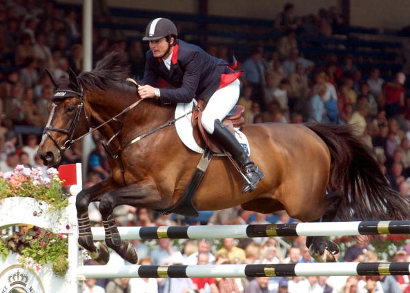 Diamant de Semilly avec son cavalier et propriétaire Éric Levallois aux championnats d'Europe en Allemagne en 2003. (Christof Koepsel/Bongarts/Getty Images)