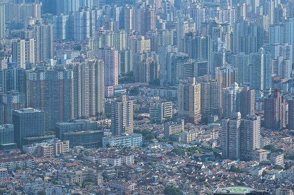 -Illustration- Les propriétaires refusent de payer leurs mensualités dans au moins une centaine de projets immobiliers en Chine. Photo par Hector RETAMAL / AFP via Getty Images.