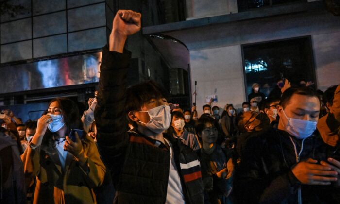 Manifestation à Shanghai le 27 novembre 2022 (Hector Retamal/AFP via Getty Images)