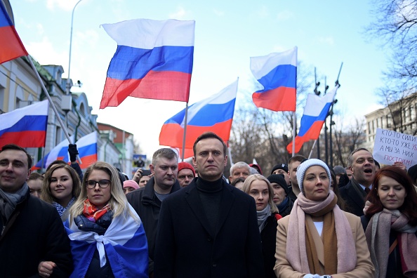En 2021, les équipes de campagne de M. Navalny (au c.) ont été déclarées « extrémistes » par les autorités, exposant les sympathisants et collaborateurs de l'opposant à des risques de poursuites pénales. (Photo KRILL KUDRYAVTSEV/AFP via Getty Images)