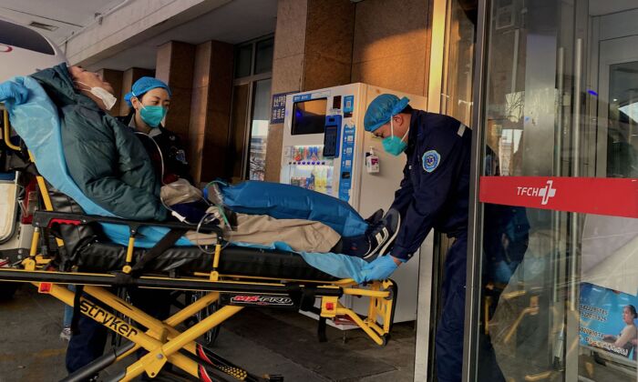 Patient atteint du Covid-19 dans un hôpital de Tianjin, le 28 décembre 2022.(Noel Cells /AFP via Getty Images)