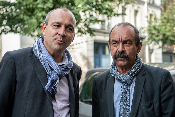 Le secrétaire général de la CGT Philippe Martinez (à gauche) et le secrétaire général de la CFDT Laurent Berger. (Photo : BERTRAND GUAY/AFP via Getty Images)