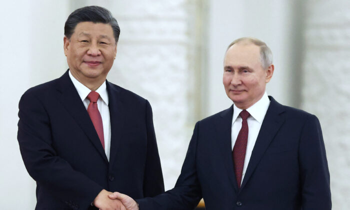 Xi Jinping rencontre Vladimir Poutine au Kremlin de Moscou, le 21 mars 2023. (Sergei Karpukhin/SPUTNIK/AFP via Getty Images)
