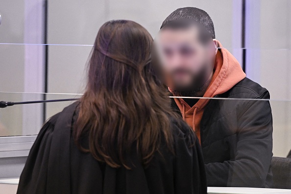 L'accusé Mohamed Abrini lors d'une session du procès des attentats du 22 mars 2016 à la Cour d'assises de Bruxelles-Capitale, mercredi 05 avril 2023 sur le site de Justitia à Haren, Bruxelles. (DIEFFEMBACQ/BELGA MAG/AFP via Getty Images)