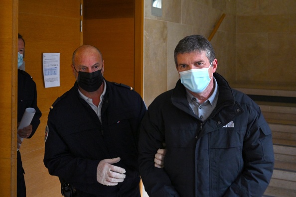 Alexandre Guerini (à d.) à la cour d'appel le 30 mars 2022. (NICOLAS TUCAT/AFP via Getty Images)