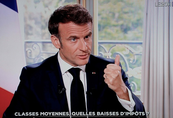 Emmanuel Macron s'exprime lors d'une interview diffusée dans le JT de 20 Heures de TF1 le 15 mai 2023. (Photo LUDOVIC MARIN/AFP via Getty Images)