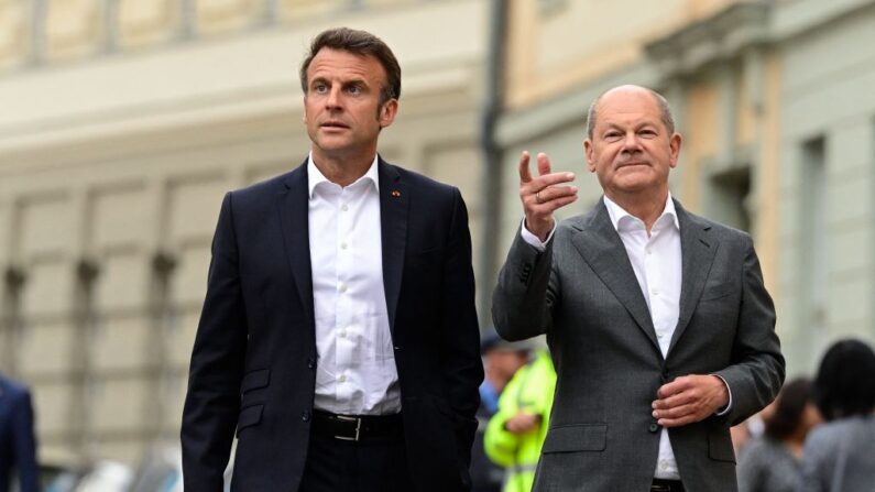 Le Président français Emmanuel Macron et le chancelier allemand Olaf Scholz. (Photo JOHN MACDOUGALL/AFP via Getty Images)