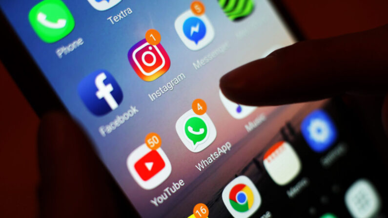 Des applications de médias sociaux sur l'écran d'un téléphone portable, le 3 janvier 2018. (Yui Mok/PA)