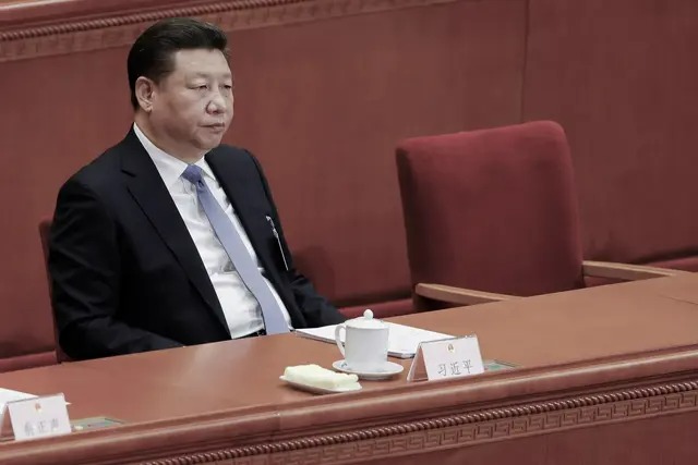 Le dirigeant chinois Xi Jinping assiste à la session d'ouverture du Congrès national du peuple, l'organe législatif suprême de la Chine, au Grand Hall du peuple à Pékin, le 5 mars 2017. (Lintao Zhang/Getty Images)