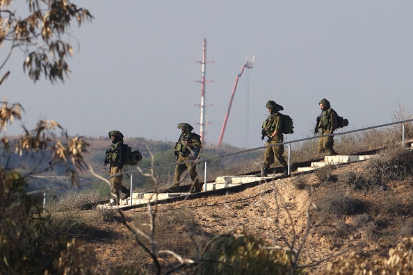 Des soldats israéliens à la recherche de terroristes du Hamas, le 17 novembre 2023. (Photo JACK GUEZ/AFP via Getty Images)