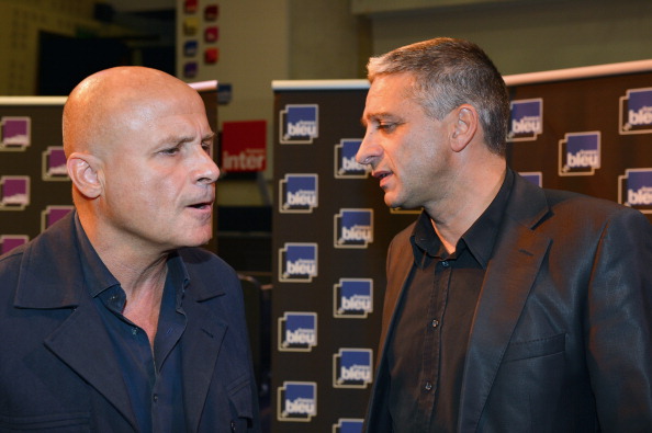 Olivier Poivre d'Arvor (à g.) et Jean-François Achilli, le 4 septembre 2012 à Paris. (MIGUEL MEDINA/AFP/GettyImages)