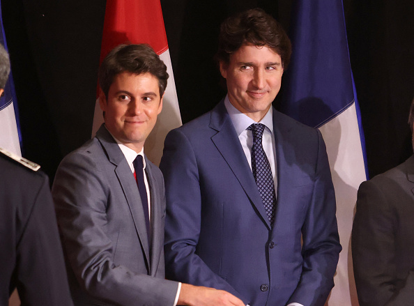 Le Premier ministre canadien Justin Trudeau et le Premier ministre Gabriel Attal arrivent la conférence de presse conjointe à l'immeuble Sir John A. Macdonald à Ottawa, le 11 avril 2024. (Photo PATRICK DOYLE/AFP via Getty Images)