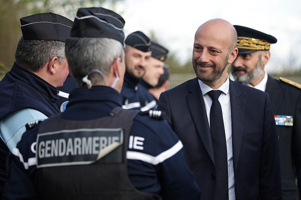 Le ministre de la Fonction publique Stanislas Guerini lors d'une visite à la gendarmerie de Pont-de-Salars, le 25 avril 2024. (Photo VALENTINE CHAPUIS/AFP via Getty Images)