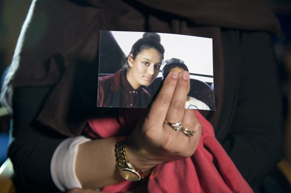 Renu, the eldest sister of Shamima Begum, holds her sisterâs photo during a media interview at New Scotland Yard in London on Feb. 22, 2015. (Laura Lean/PA Wire/Getty Images)