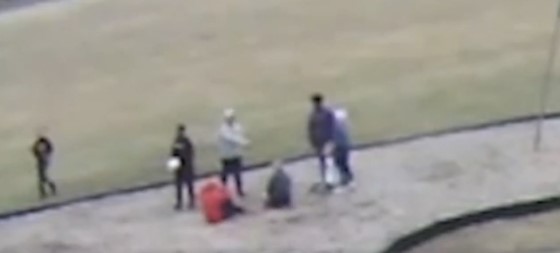 Screenshot from video released by the school district in Springfield, Ohio, showing a Black student addressing one of three white students who were forced to kneel on the ground and say "Black Lives Matter." (Springfield, Ohio School District)